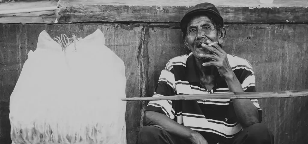 Old man smoking cannabis
