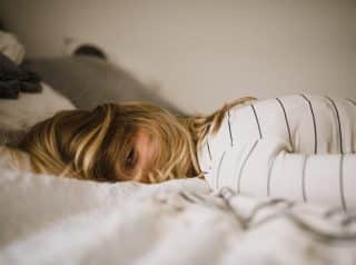 A woman lying on the bed