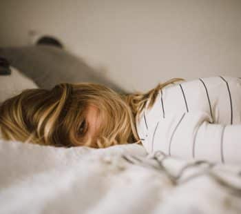 A woman lying on the bed